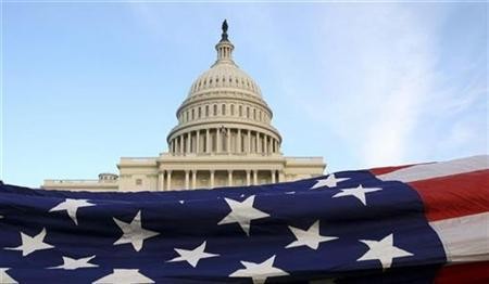 A U.S. Flag is displayed in front of the Capitol during a Flag Ceremony in Washington, November 2, 2010.