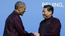 U.S. President Barack Obama and China's President Xi Jinping at the APEC Welcome Banquet November 10, 2014.