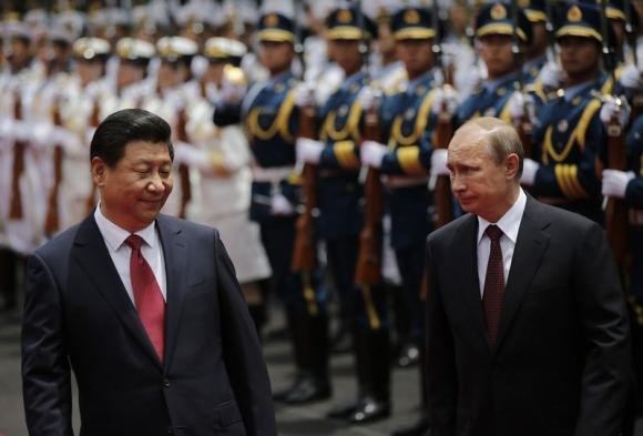 Russia's President Vladimir Putin and China's President Xi Jinping in Shanghai, May 20, 2014.