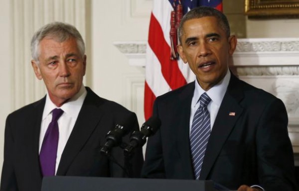U.S. President Barack Obama (R) announces the resignation of Defense Secretary Chuck Hagel (L) at the White House in Washington, November 24, 20