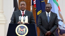 Kenyan President Uhuru Kenyatta (L), and his Deputy William Ruto