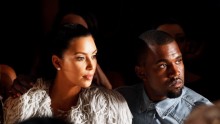Kanye West embracing Kim Kardashian