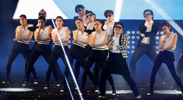 South Korean rapper Psy performs "Gentleman" during his concert "Happening" in Seoul April 13, 2013