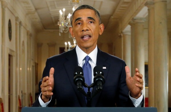 U.S. President Barack Obama commutes sentences of 8 people and pardons 12 others