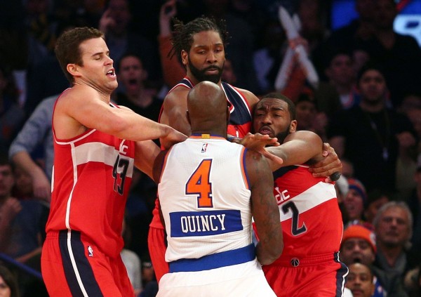 The brawl between Quincy Acy (4) and John Wall (2)