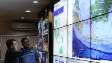 Indonesian officials study map of flight area 