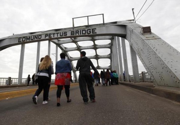 People join march across Selma, Alabama bridge to commemorate "Bloody Sunday"