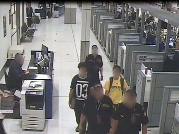 Surveillance Video of Sydney airport shows 2 teenage brothers, in yellow & black shirts, suspected of heading to Mid-East to join ISIS