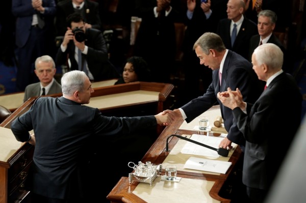 Israeli Prime Minister Benjamin Netanyahu (L) is greeted by U.S. House leaders at the Capitol Hill, March 3, 2015.