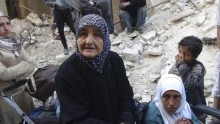 Yarmouk Camp refugees waiting for food and aids from the United Nations Relief and Work Agency.