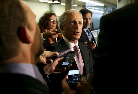 Senate Foreign Relations Committee Chairman Senator Bob Corker (R-TN) (C) talks to reporters before meeting with Secretary of State John Kerry (not pictured) on nuclear negotiations with Iran on Capitol Hill in Washington April 14, 2015.