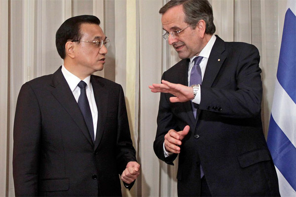 Chinese Premier Li Keqiang talks with Greek Prime Minister Antonis Samaras during their meeting in Greece on June 17, 2014.