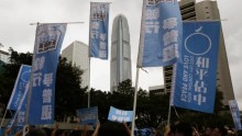 Supporters of the Occupy Central movement took to the streets to encourage Hong Kong residents to participate in an unofficial pro-democracy referendum, June 20, 2104.