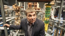 Chris Burden with his large-scale kinetic sculpture, 