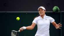 Li Na fires a blistering forehand down the line in the 2nd round of Wimbledon