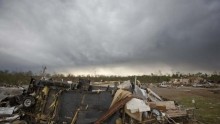 Cars and debris are pictured at Mayflower RV in Mayflower, Arkansas April 29, 2014.