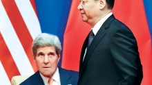 U.S. Secretary of State John Kerry and Chinese President Xi Jinping
