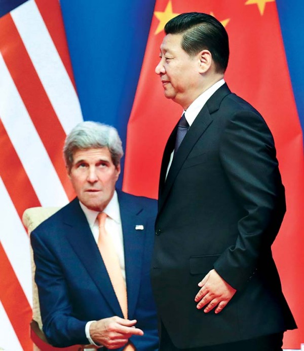 U.S. Secretary of State John Kerry and Chinese President Xi Jinping