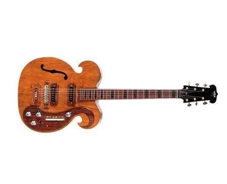 Guitar borrowed by Beatle George Harrison auctioned off at $490,000