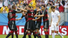 Thomas Mueller and the Germans celebrate their victory over the Americans