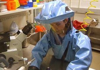 Researcher working with the Ebola virus