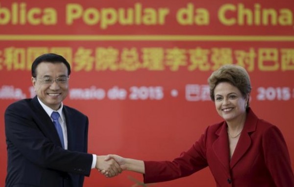 Chinese Premier Li Keqiang greets Brazil's President Dilma Rousseff during a meeting at the Planalto Palace in Brasilia, May 19, 2015.