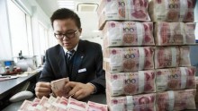 China to ease overseas investment limits