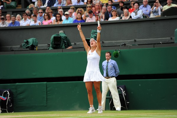 Jubilant Angelique Kerber defeats crowd favorite Maria Sharapova at the 2014 Wimbledon Championships