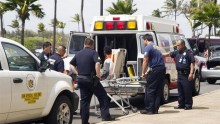 A 16-year-old boy is carried on a stretcher in Maui, Hawaii