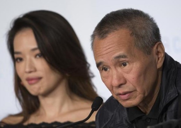 Cast member Shu Qi and director Hou Hsiao-Hsien (R) 