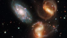 Hubble Space Telescope Interesting Find: 4 Galaxies Including Galactic Cannibal Snap