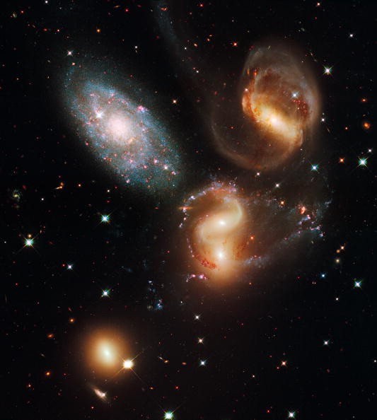 Hubble Space Telescope Interesting Find: 4 Galaxies Including Galactic Cannibal Snap