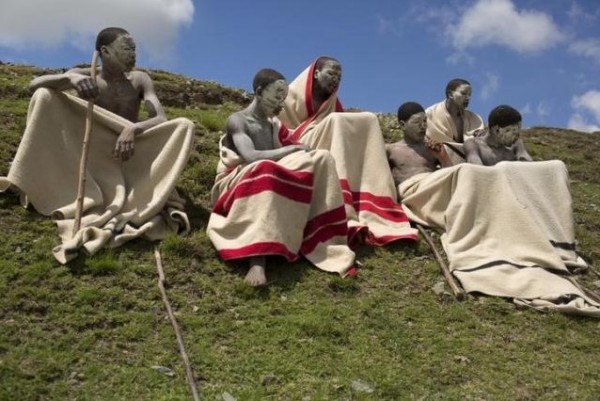 Initiates pose on a field in Qunu, in the Eastern Cape December 15, 2013.