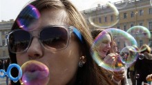 Participants take part in a soap bubble festival