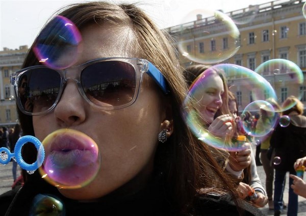 Participants take part in a soap bubble festival
