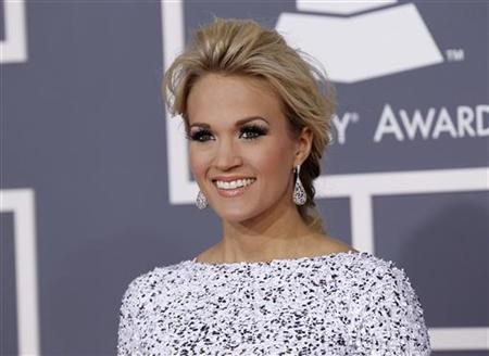 Country singer Carrie Underwood arrives at the 54th annual Grammy Awards in Los Angeles, California February 12, 2012.