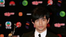 Taiwan singer Jay Chou holds his trophy at the Hong Kong Film Awards in Hong Kong April 15, 2007.