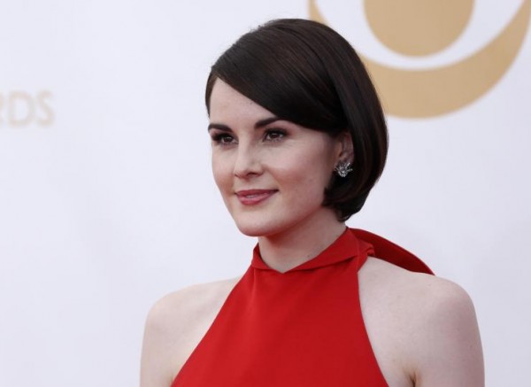 Actress Michelle Dockery, from the PBS series "Downton Abbey," arrives at the 65th Primetime Emmy Awards in Los Angeles Sept. 22, 2013. 