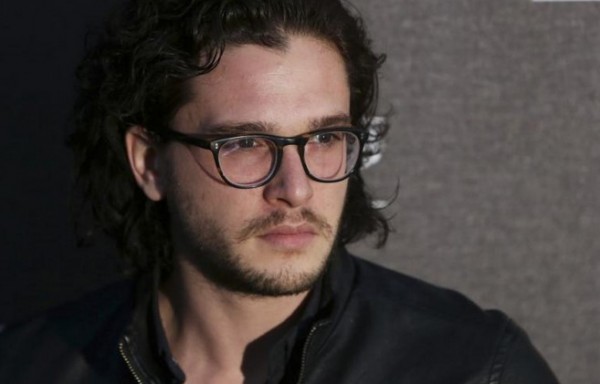 British actor Kit Harington poses for photographers at the Battersea Power Station Annual Party in London April 30, 2014. 