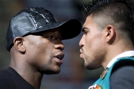 September 2011 file photo of former boxing champ Victor Ortiz (right) during a pre-fight news conference in La Vegas. 