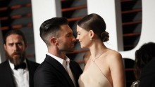 Musician Adam Levine and wife, model Behati Prinsloo, arrive at the 2015 Vanity Fair Oscar Party in Beverly Hills, California February 22, 2015.