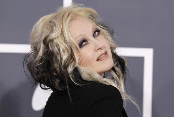 Singer Cyndi Lauper poses as she arrives at the 54th annual Grammy Awards in Los Angeles, California February 12, 2012.