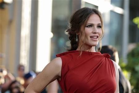 Hollywood star Jennifer Garner smiles through divorce and rumors of Ben Affleck's affair with their kids' nanny.