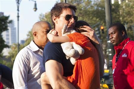 A July 2012 file photo of actor Tom Cruise with daughter Suri. 