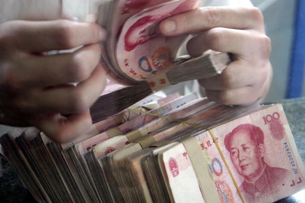 China Weakens Currency