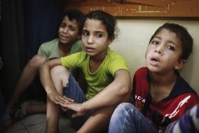 Gaza school housing civilians hit by rocket fire