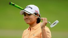 Yani Tseng of Chinese Taipei sinks a 12-foot birdie putt on the 18th hole to win against the United States