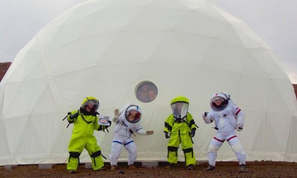 The six members of the HI-SEAS 2 crew pose inside their Mars mock-up habitat.