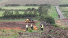 Archeological excavations at Hinkley Point in Somerset are recorded.