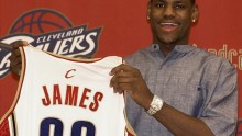 LeBron James proudly showing off his Cleveland Cavaliers jersey during the 2003 NBA Draft